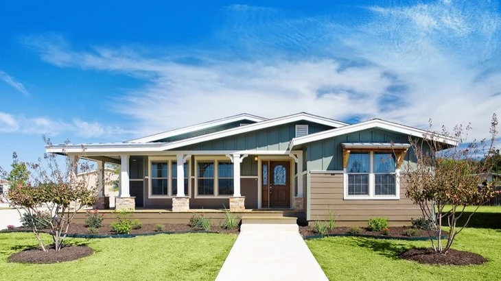 Double wide modular home with a covered porch